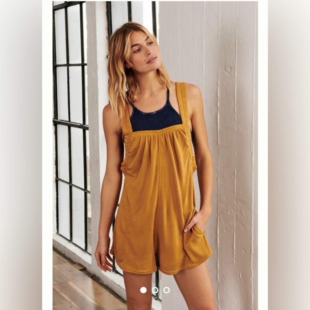 Free People Movement Heart Center Romper 
Gold 
Size XS